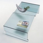 Журнальный столик выполненый из единого куска стекла. Несколько уровней основной поверхности