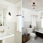 Ванная комната в белом цвете с черной отдельно стоящей ванной